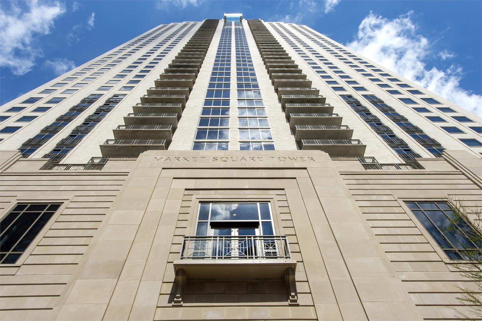 Dramatic view of exterior elevation of Market Square Tower Apartment Building in Houston, Texas