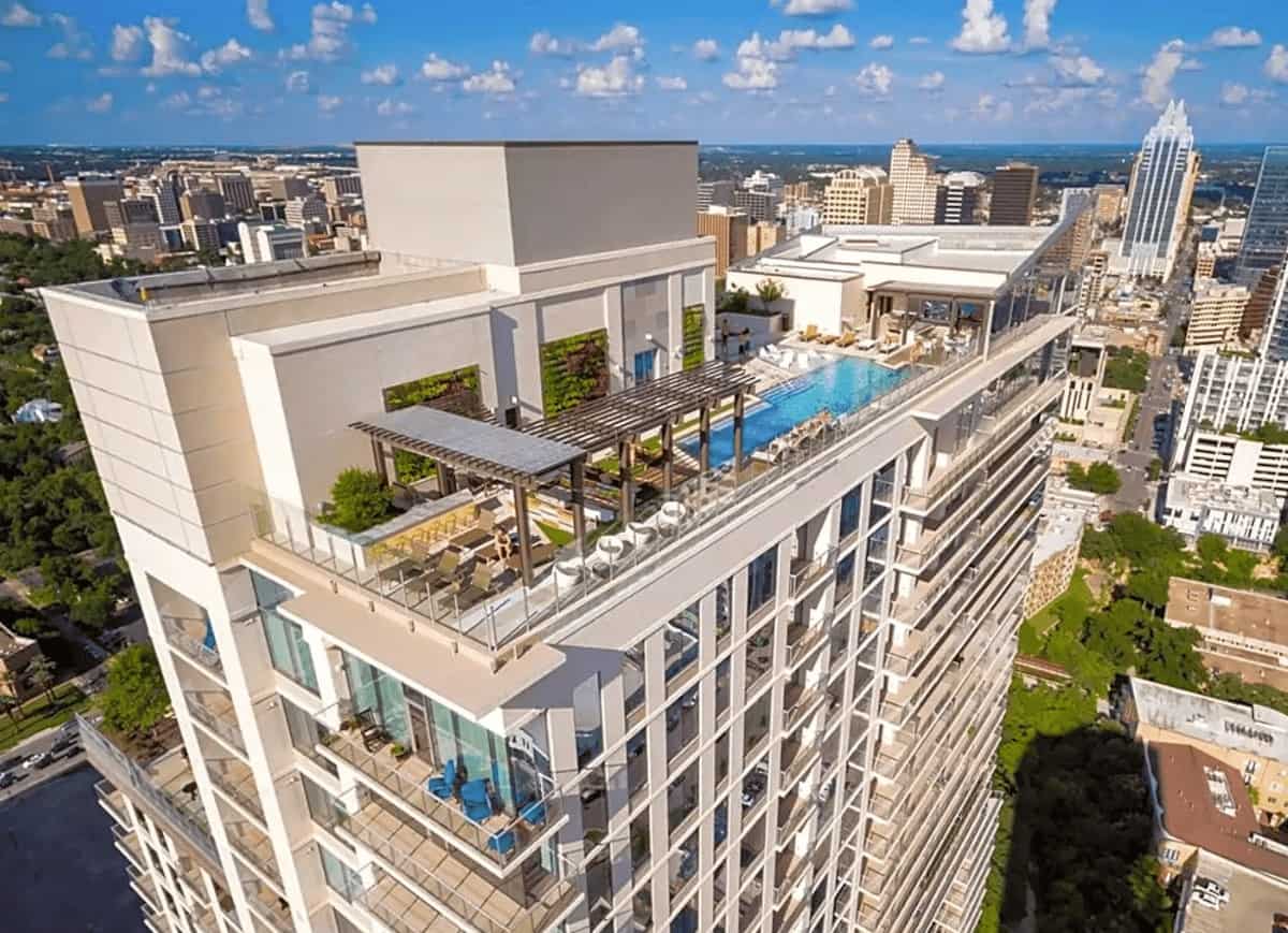 Rooftop pool with view of Downtown Austin at The Bowie apartment building